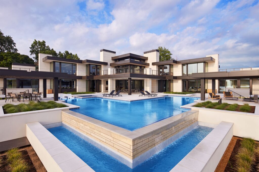 Image of a 2022 warm modern home with an infinity pool
