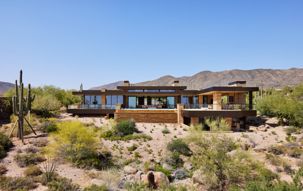Photo of a warm modern home in a desert. Photo by Corey Gaffer