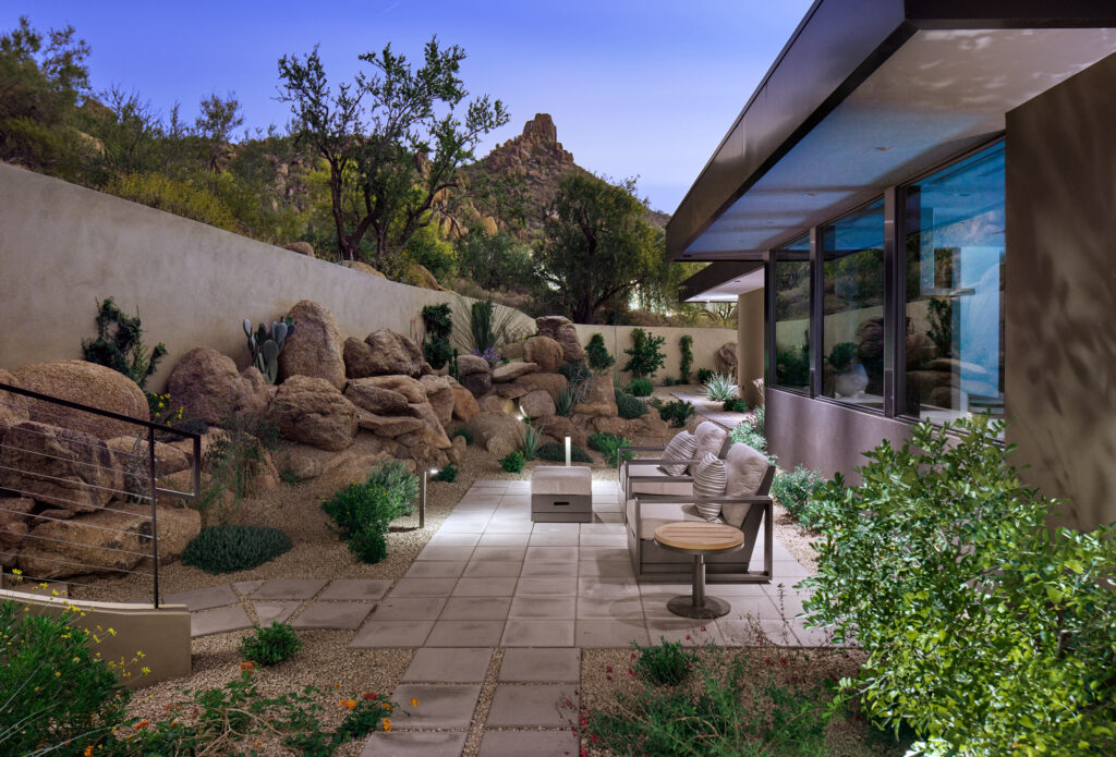 Image of an outdoor patio with a boulder garden in Arizona